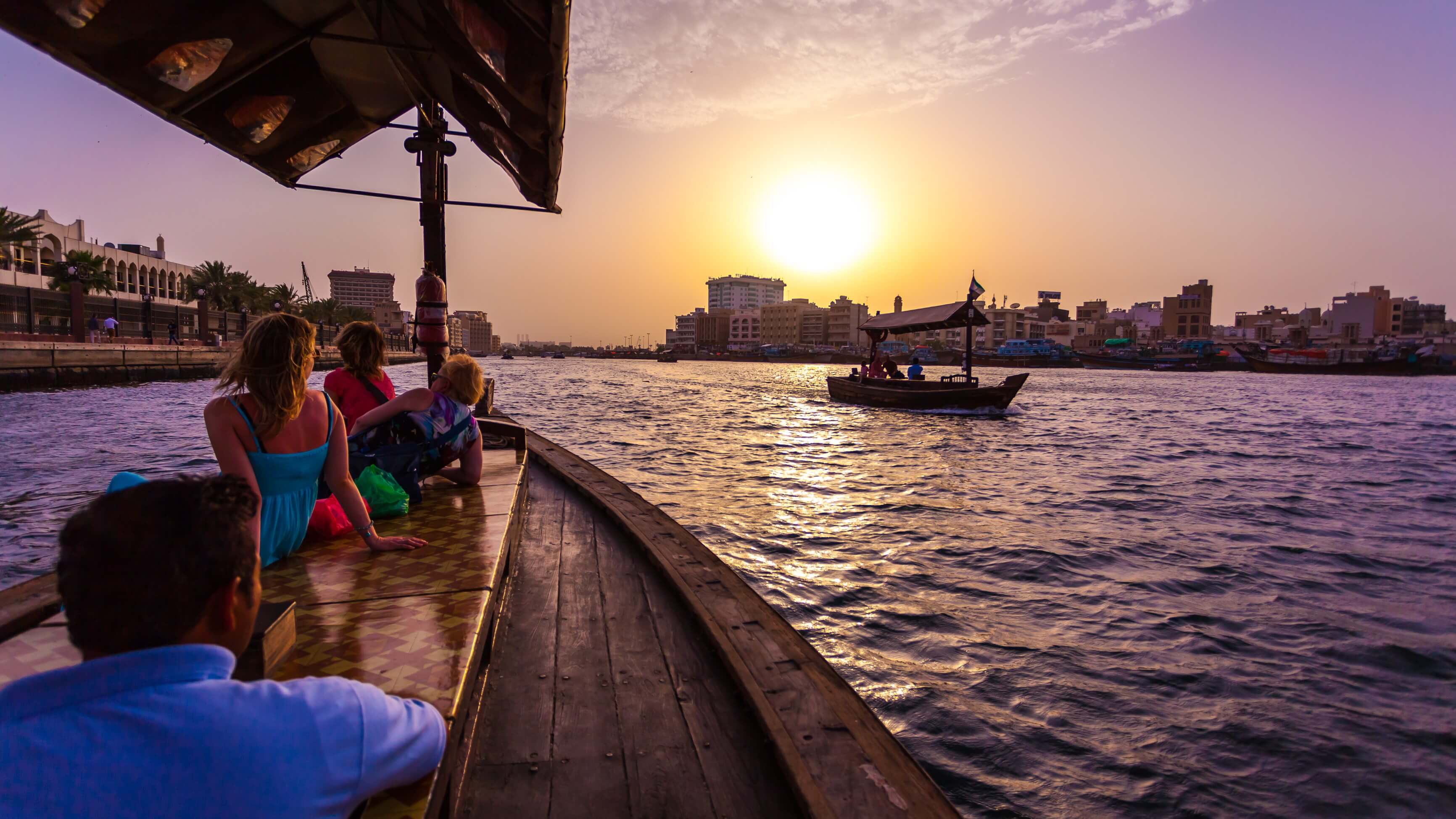 Image of Water, Waterfront, Nature, Outdoors, Sky, City, Urban, Adult, Male, Man, Person, Metropolis, Female, Woman, Boat, Vehicle, Scenery, Cityscape, Handbag, Pier, 