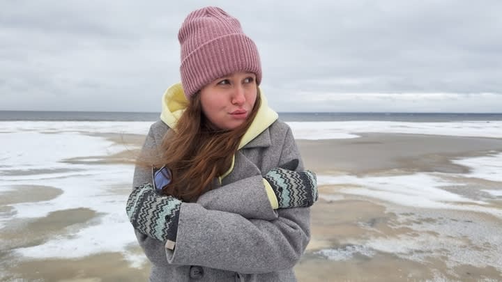 Image of Cap, Hat, Face, Head, Person, Photography, Portrait, Glove, Child, Female, Girl, Beach, Coast, Nature, Outdoors, Sea, Shoreline, Water, Coat, 