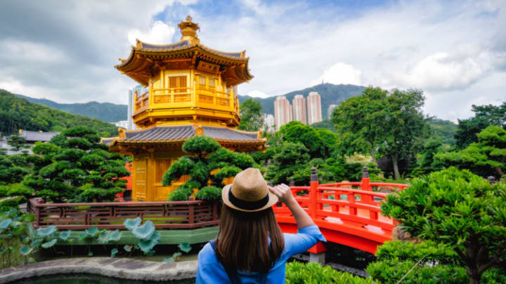 Image of Photography, Nature, Outdoors, Scenery, Garden, Female, Girl, Person, Teen, Landscape, Hat, Pagoda, Prayer, Shrine, Temple, Potted Plant, Grass, 