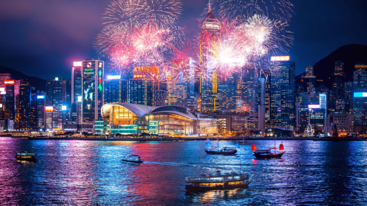 Image of Cityscape, Urban, City, Water, Waterfront, Metropolis, Boat, Vehicle, Nature, Outdoors, Scenery, Downtown, Fireworks, 