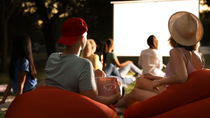 Image of Hat, Sun Hat, Adult, Female, Person, Woman, Cap, Girl, Teen, Boy, Child, Male, Cup, Couch, Furniture, 