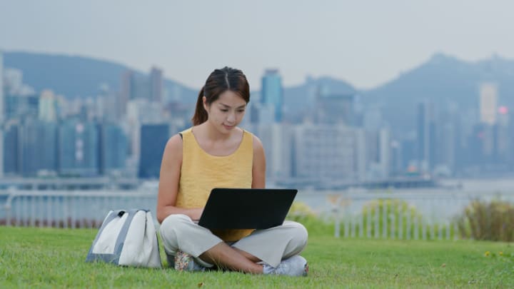 Image of Person, Sitting, Reading, Grass, Adult, Female, Woman, Computer, Electronics, Laptop, Pc, Photography, 