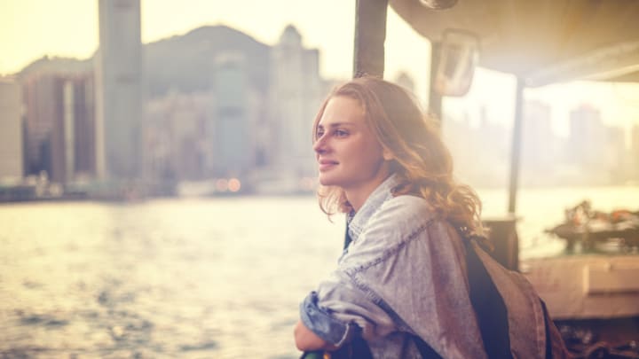 Image of Face, Head, Person, Photography, Portrait, City, Blonde, Hair, Urban, Smile, Coat, Jacket, Adult, Female, Woman, Water, Waterfront, Metropolis, Lady, Outdoors, 