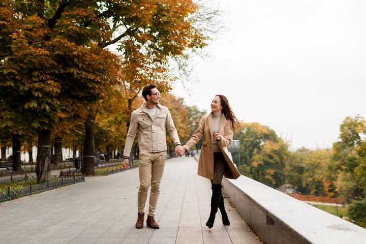 Image of Hand, Person, Holding Hands, Coat, Adult, Male, Man, Pants,