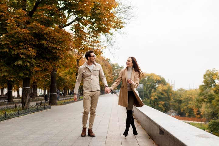 Image of Hand, Person, Holding Hands, Coat, Adult, Male, Man, Pants, 