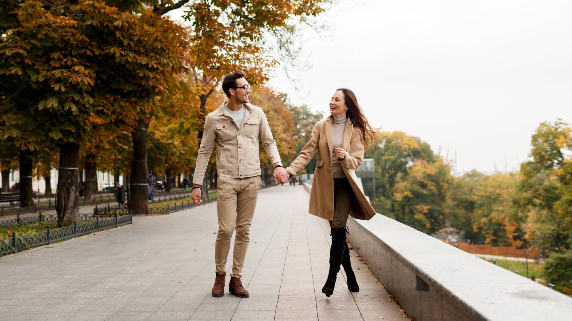 Image of Hand, Person, Holding Hands, Adult, Male, Man, Coat, Pants, 