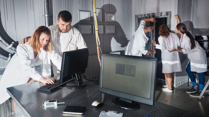 Image of Laboratory, Adult, Female, Person, Woman, Coat, Girl, Teen, Computer Hardware, Electronics, Hardware, Monitor, Screen, Lab, Mobile Phone, Male, Man, 