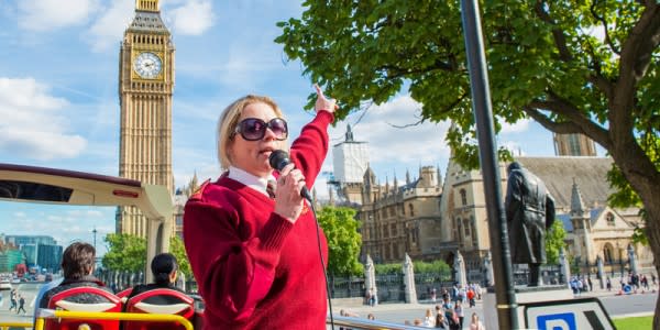 Image of Clock Tower, Tower, Adult, Female, Person, Woman, City, Microphone, Photography, Glasses, Male, Man, People, 