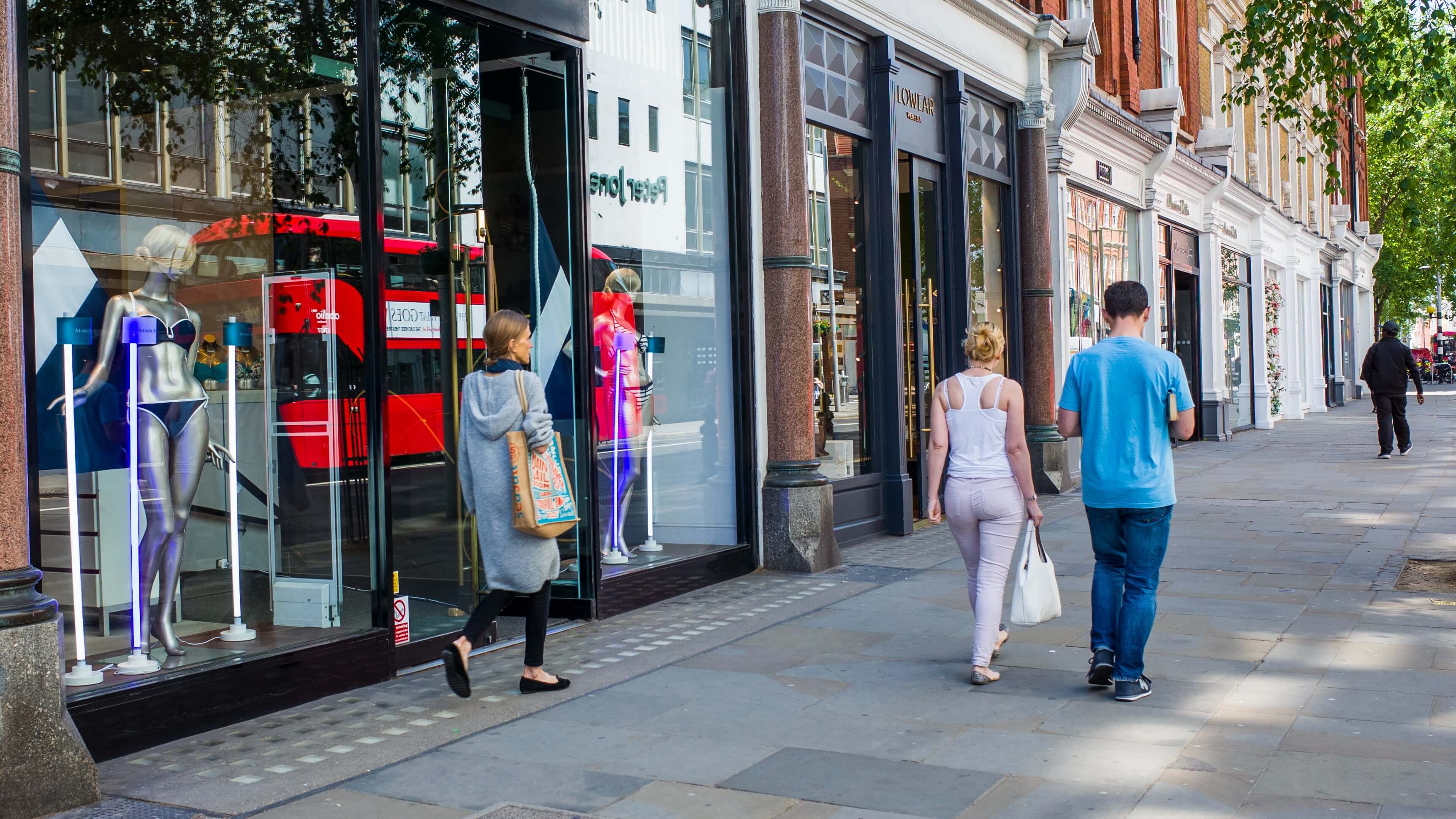 Image of Person, Walking, City, Urban, Bag, Handbag, Shoe, Path, Road, Street, Adult, Female, Woman, Pedestrian, Pants, 