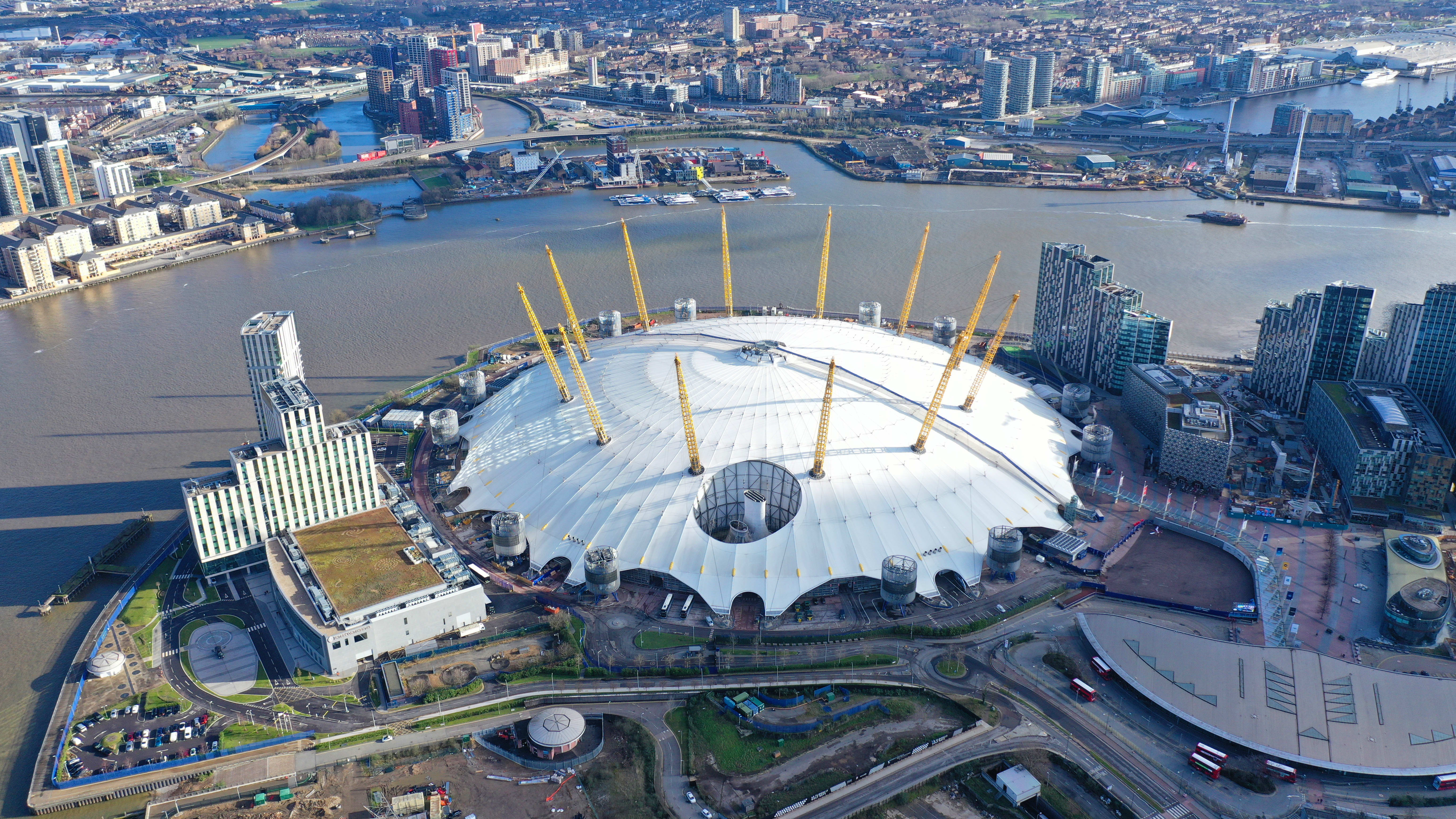 Image of City, Outdoors, Building, Cityscape, Urban, Person, Arena, Aerial View, Stadium, 