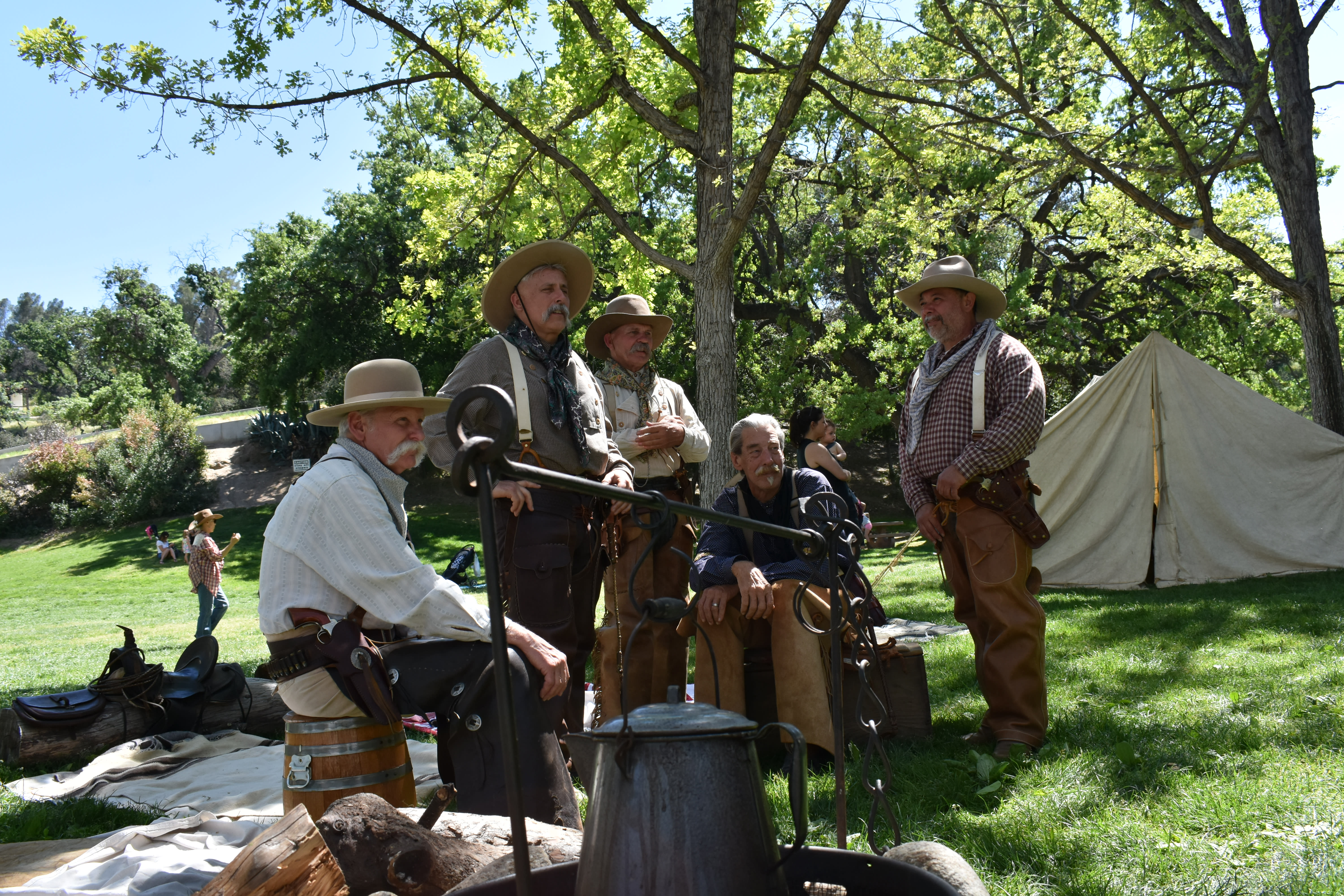 Image of Adult, Male, Man, Person, Tent, Hat, Camping, Outdoors, Sun Hat, Tree, Handbag, 