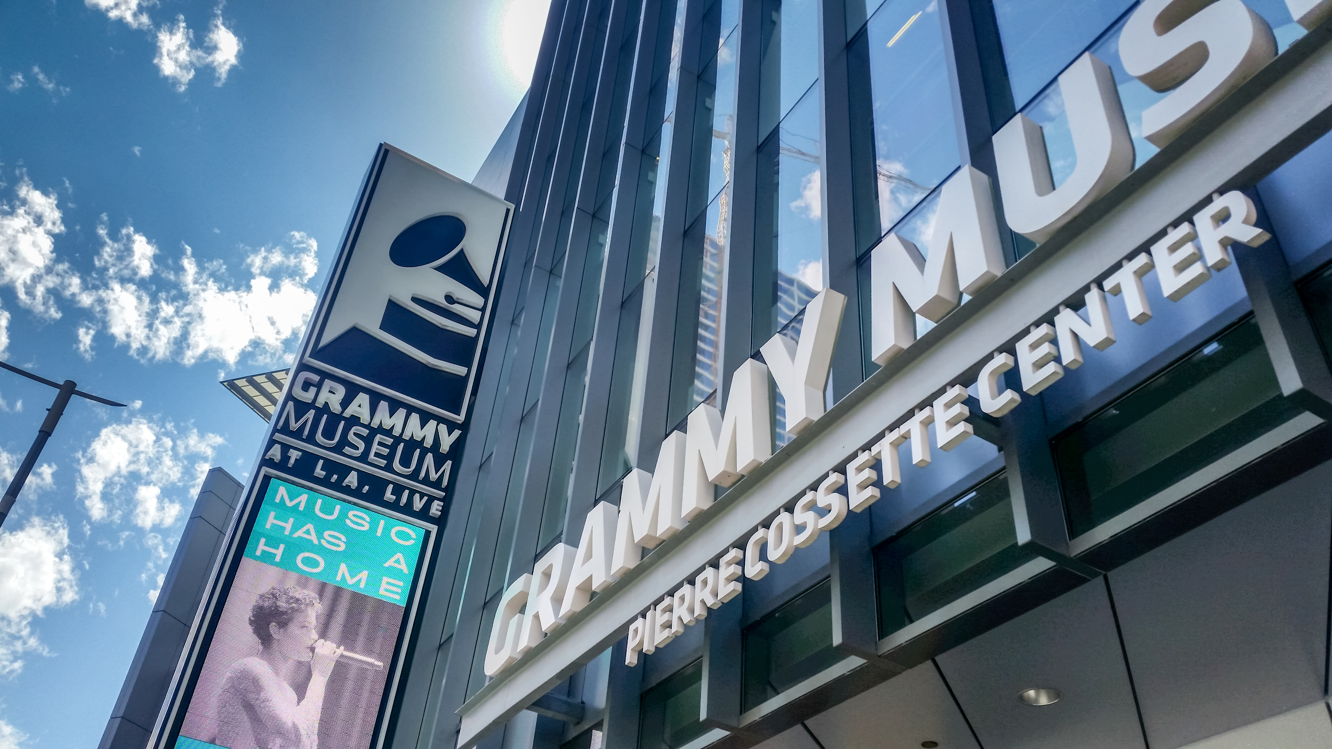 Image of Building, Office Building, City, Person, Urban, Sign, Symbol, 