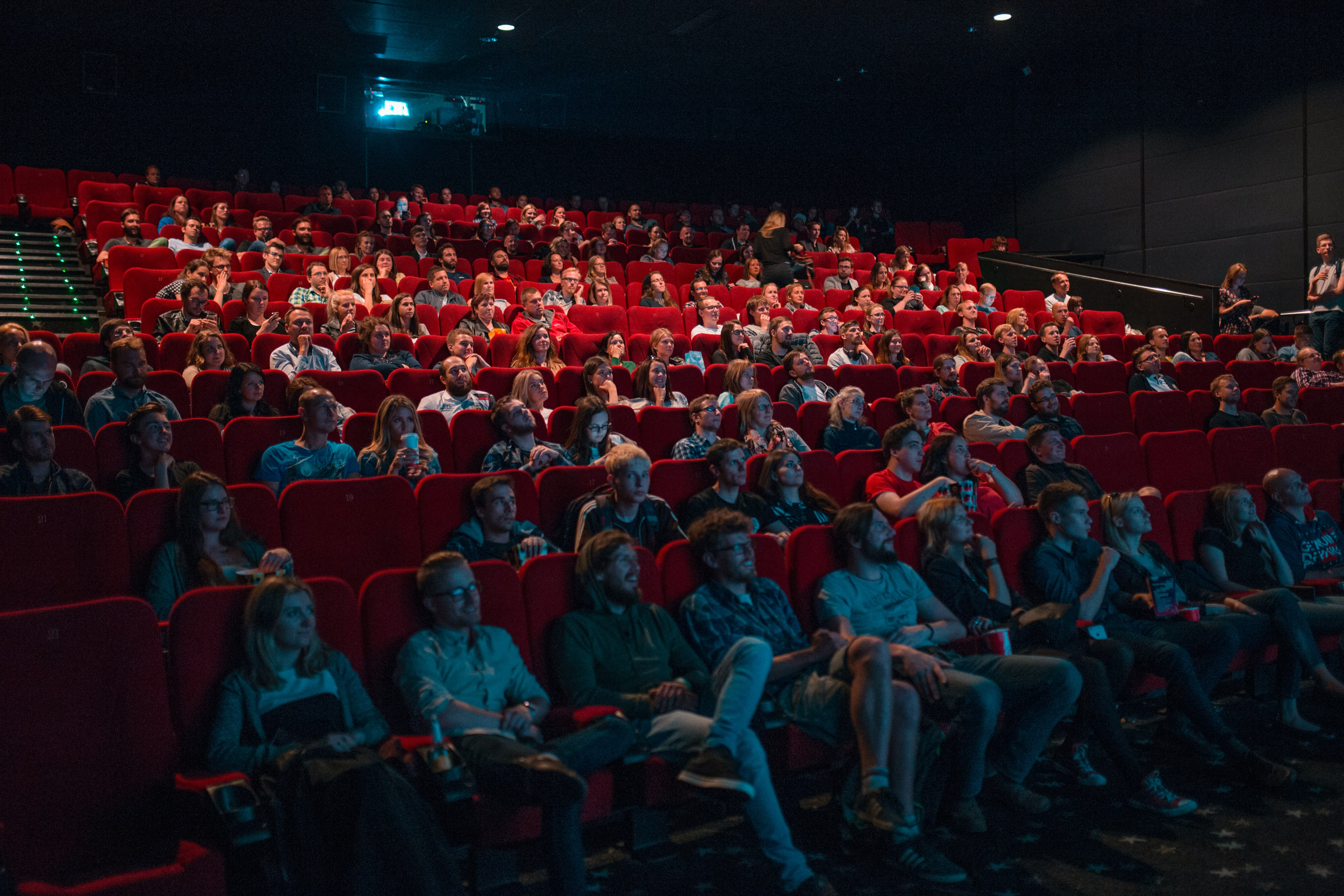 Image of People, Person, Cinema, Indoors, Theater, Shoe, Adult, Male, Man, Female, Woman, Crowd, Glasses, 