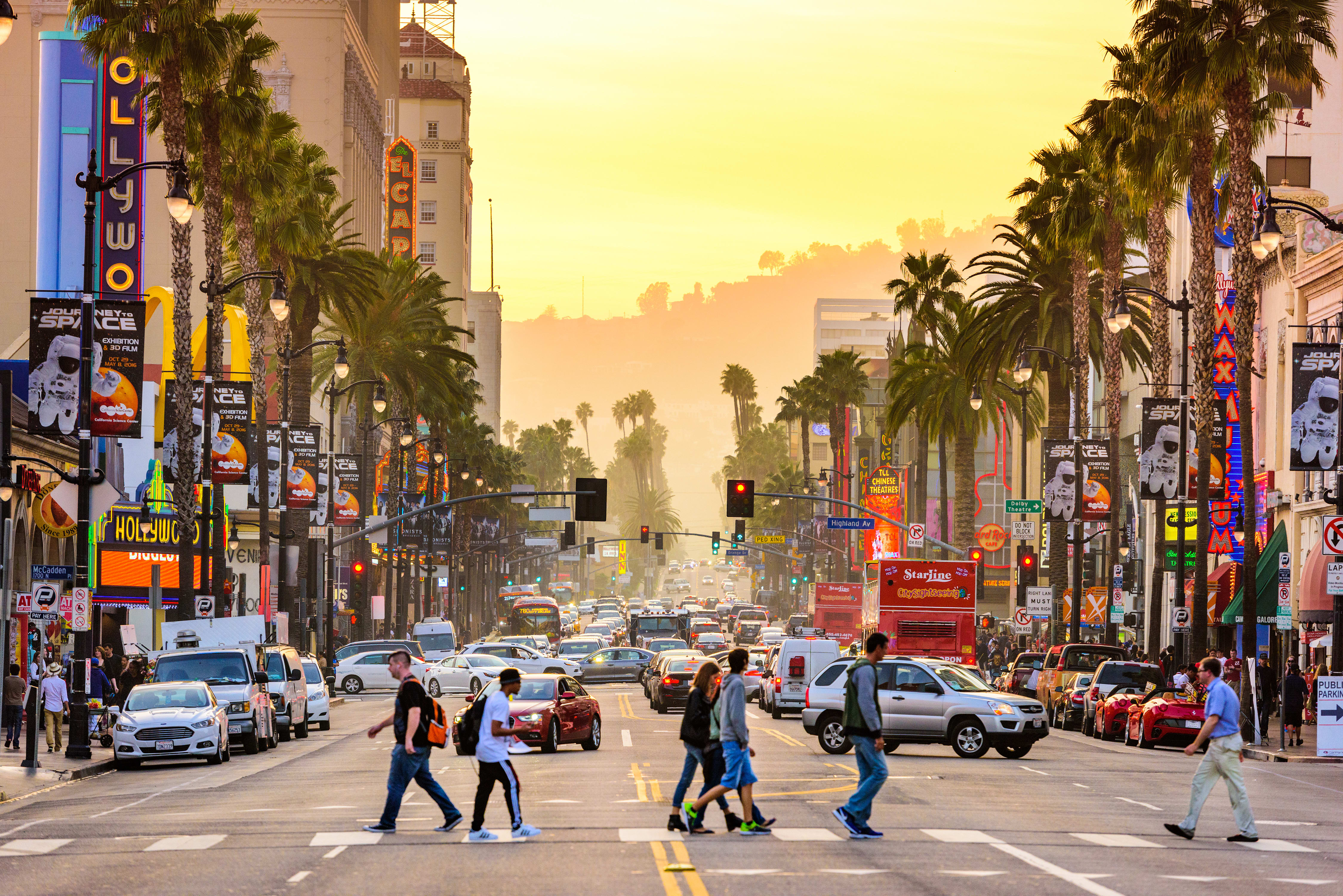 Image of City, Metropolis, Urban, Person, Road, Light, Traffic Light, Walking, Car, Vehicle, Street, Neighborhood, Pedestrian, Cityscape, Truck, Backpack, 