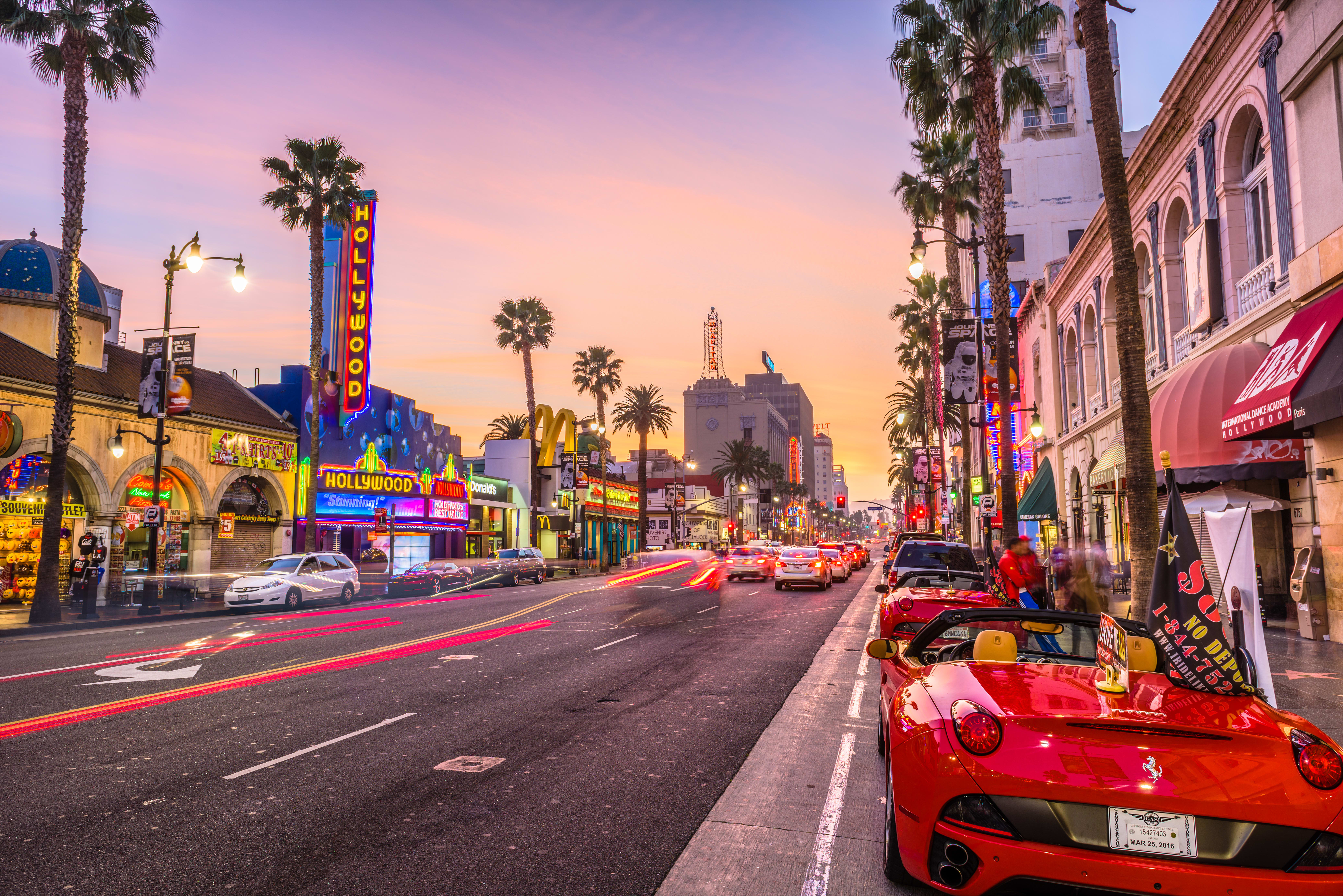 Image of Road, City, Metropolis, Urban, Street, Path, Sidewalk, Intersection, Car, Vehicle, Neighborhood, Tarmac, Tree, Person, Cityscape, Freeway, 