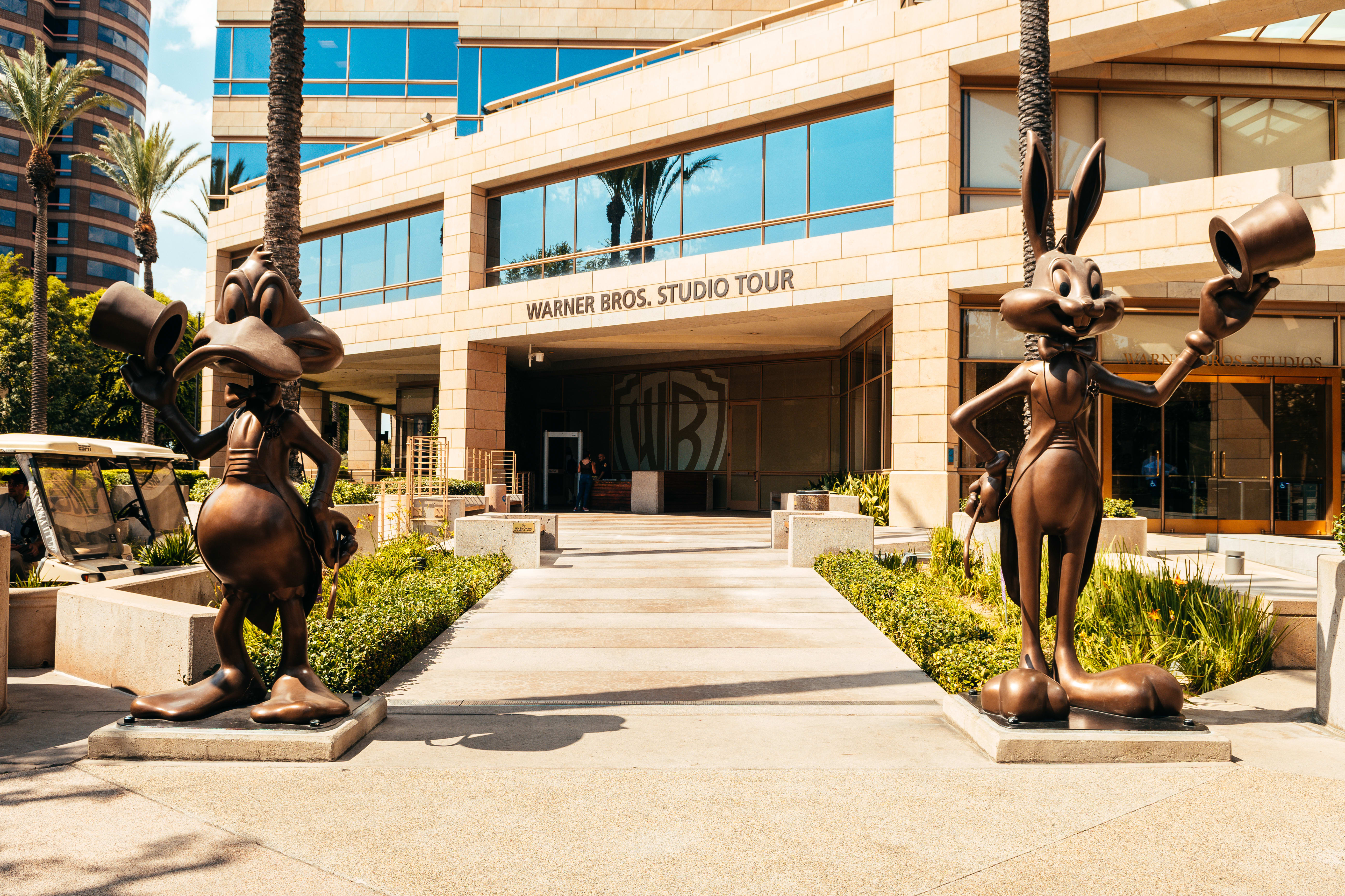 Image of Office Building, Bronze, Adult, Female, Person, Woman, City, Urban, Campus, 