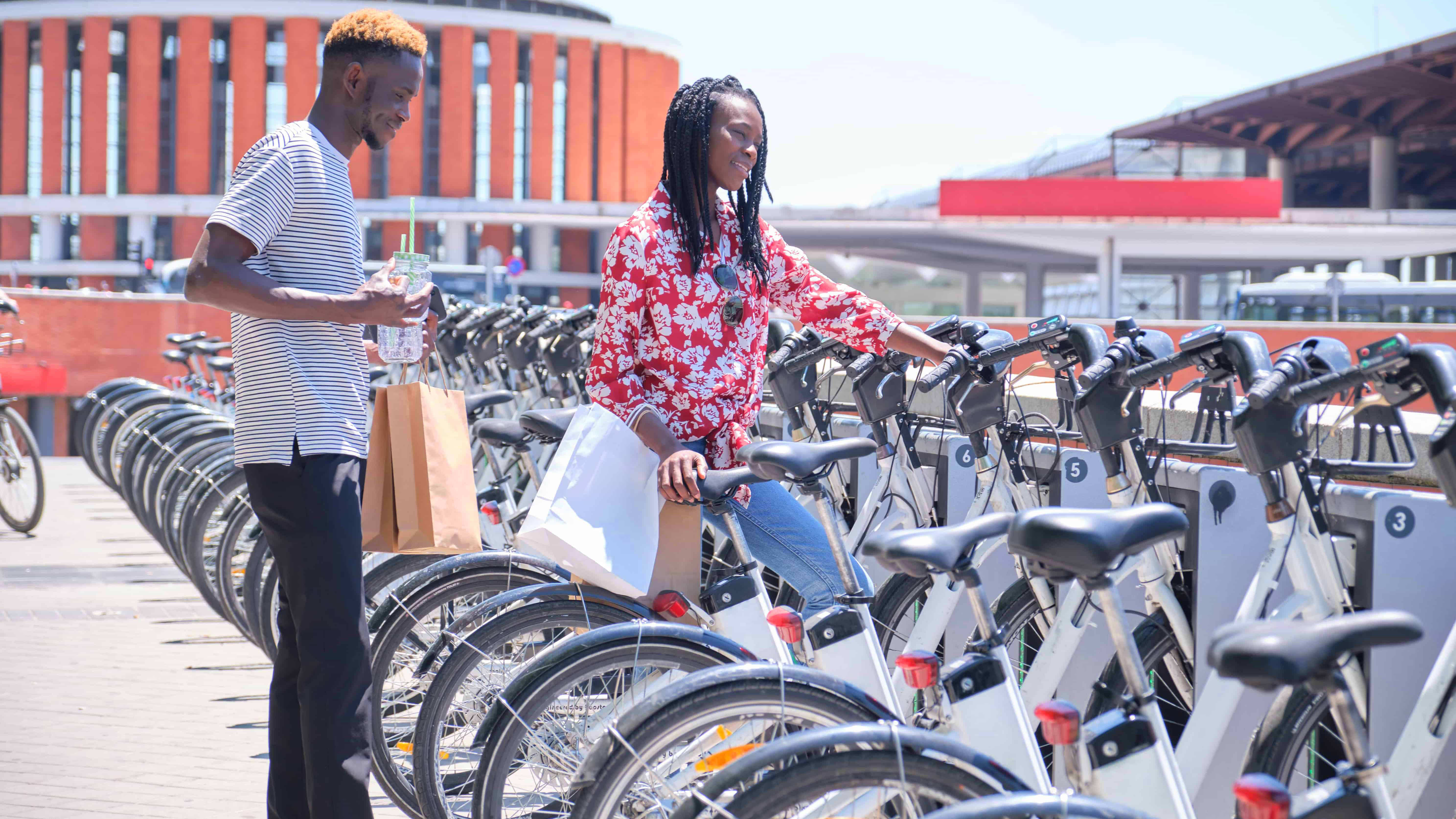 Image of Adult, Male, Man, Person, Female, Woman, Bicycle, Vehicle, Handbag,