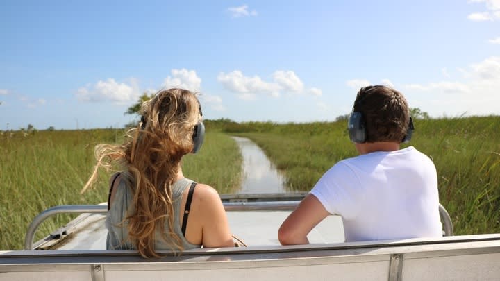 Image of Headphones, Adult, Male, Man, Person, Female, Girl, Teen, Fun, Vacation, Outdoors, 