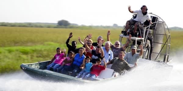 Image of Child, Female, Girl, Person, Adult, Male, Man, Shoe, People, Boat, Boating, Vehicle, Water, Water Sports, Woman, Hat, 