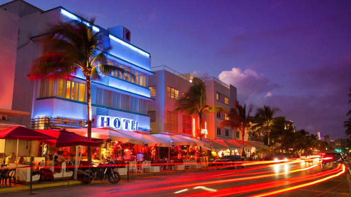 Image of City, Metropolis, Urban, Road, Street, Hotel, Neighborhood, Car, Motorcycle, Person, Chair, Path, Sidewalk, Tree, Indoors, Restaurant, Lighting, 