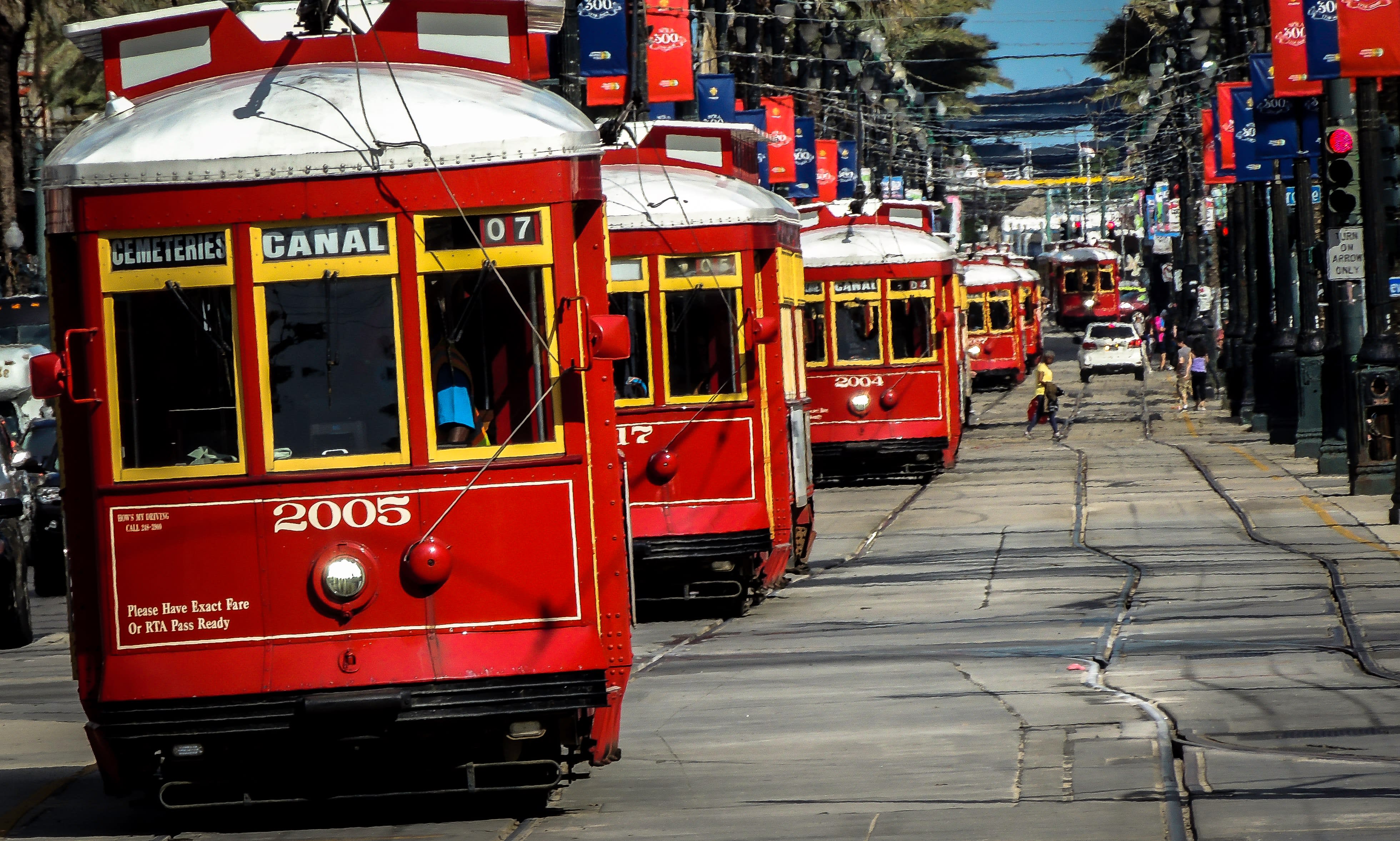 Image of Cable Car, Vehicle, Streetcar, Car, Traffic Light, Person, Bus, 