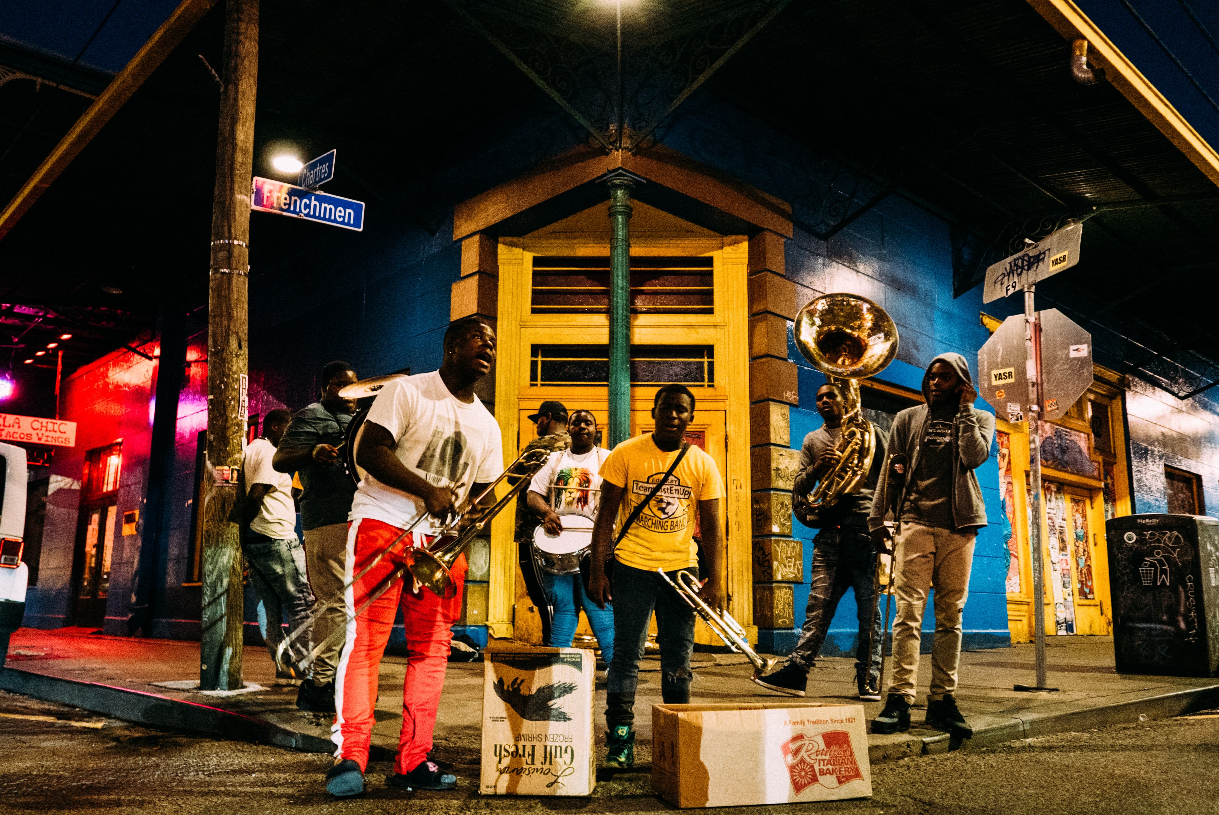 Image of Urban, Adult, Male, Man, Person, Shoe, Group Performance, Music, Music Band, Musical Instrument, Musician, Performer, Hat, City, Glove, Road, Street, Box, Pants, Handbag, 