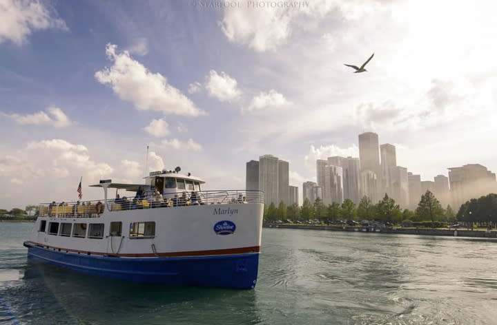 Image of Boat, Ferry, Vehicle, City, Yacht, Water, Waterfront, Bird, Urban, Cityscape, Person, Boating, Water Sports, Metropolis, 