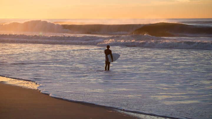 Image of Person, Standing, Nature, Outdoors, Sea, Water, Beach, Coast, Shoreline, Walking, Horizon, Sky, 