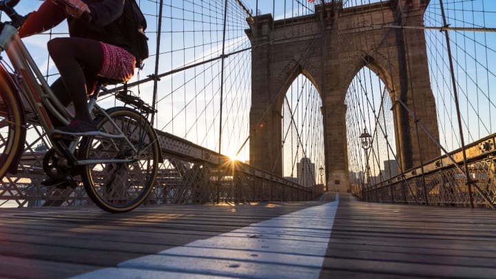 Image of Bicycle, Vehicle, Adult, Female, Person, Woman, Bridge, Brooklyn Bridge, Landmark, 