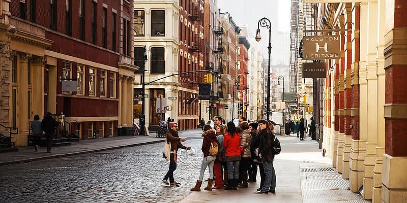 Image of City, Urban, Road, Street, Shoe, People, Person, Path, Handbag, Pedestrian, Traffic Light, Backpack, Bicycle, 