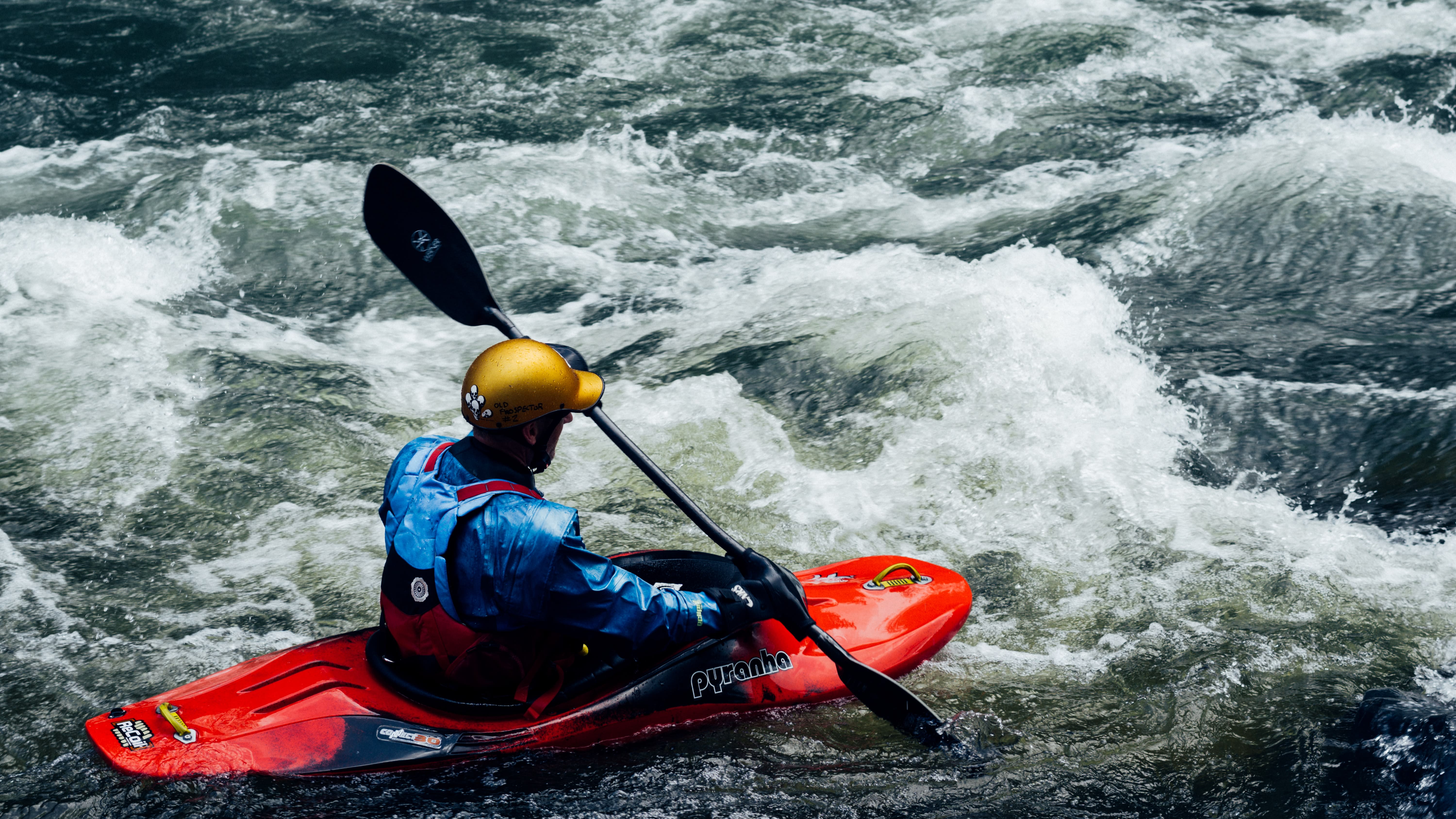 Image of Water, Helmet, Boat, Vehicle, Canoe, Kayak, Kayaking, Person, Rowboat, Water Sports, Adult, Male, Man, 