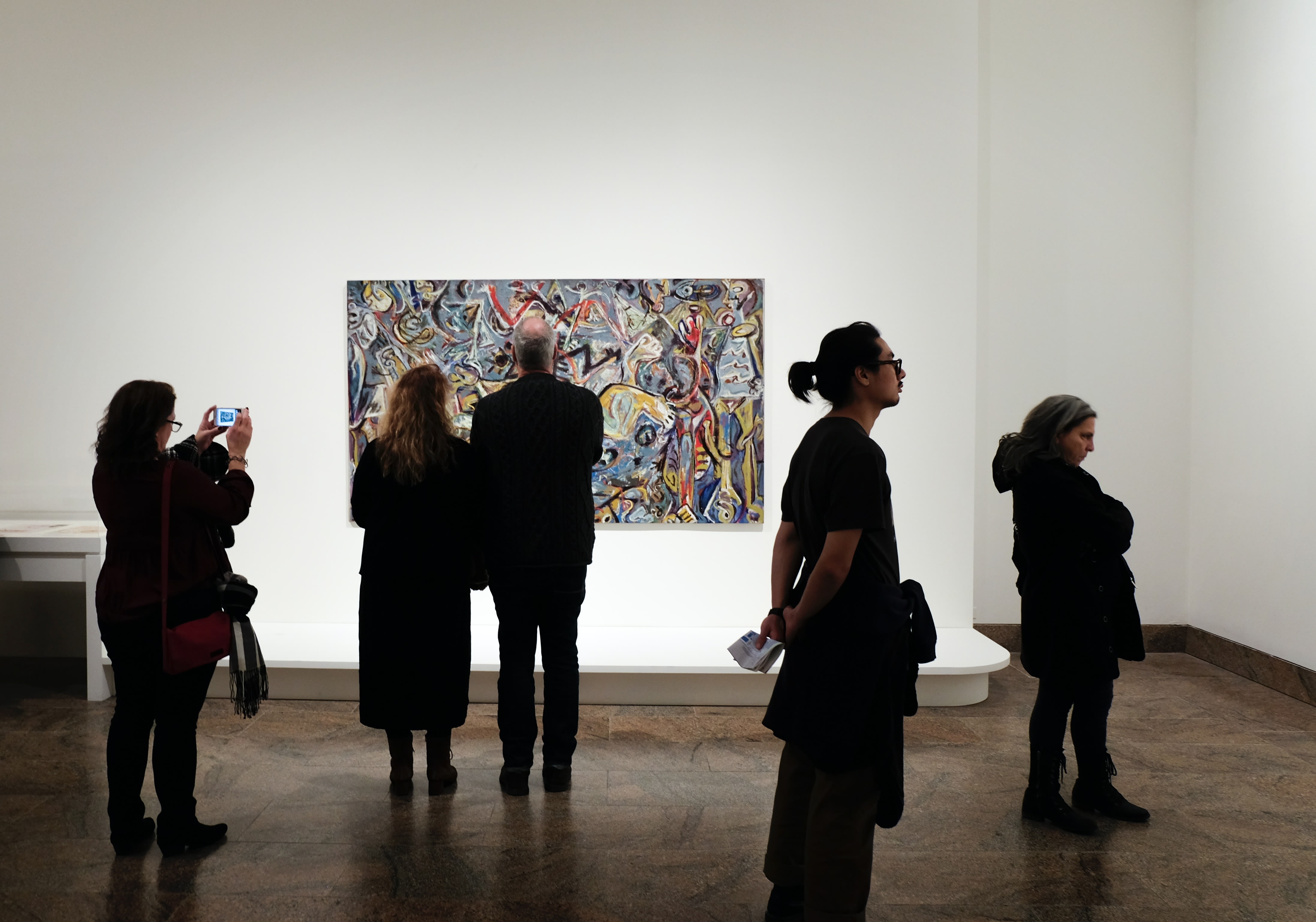 Image of Art, Adult, Female, Person, Woman, Art Gallery, Male, Man, Coat, Bag, Handbag, Floor, Shoe, Flooring,