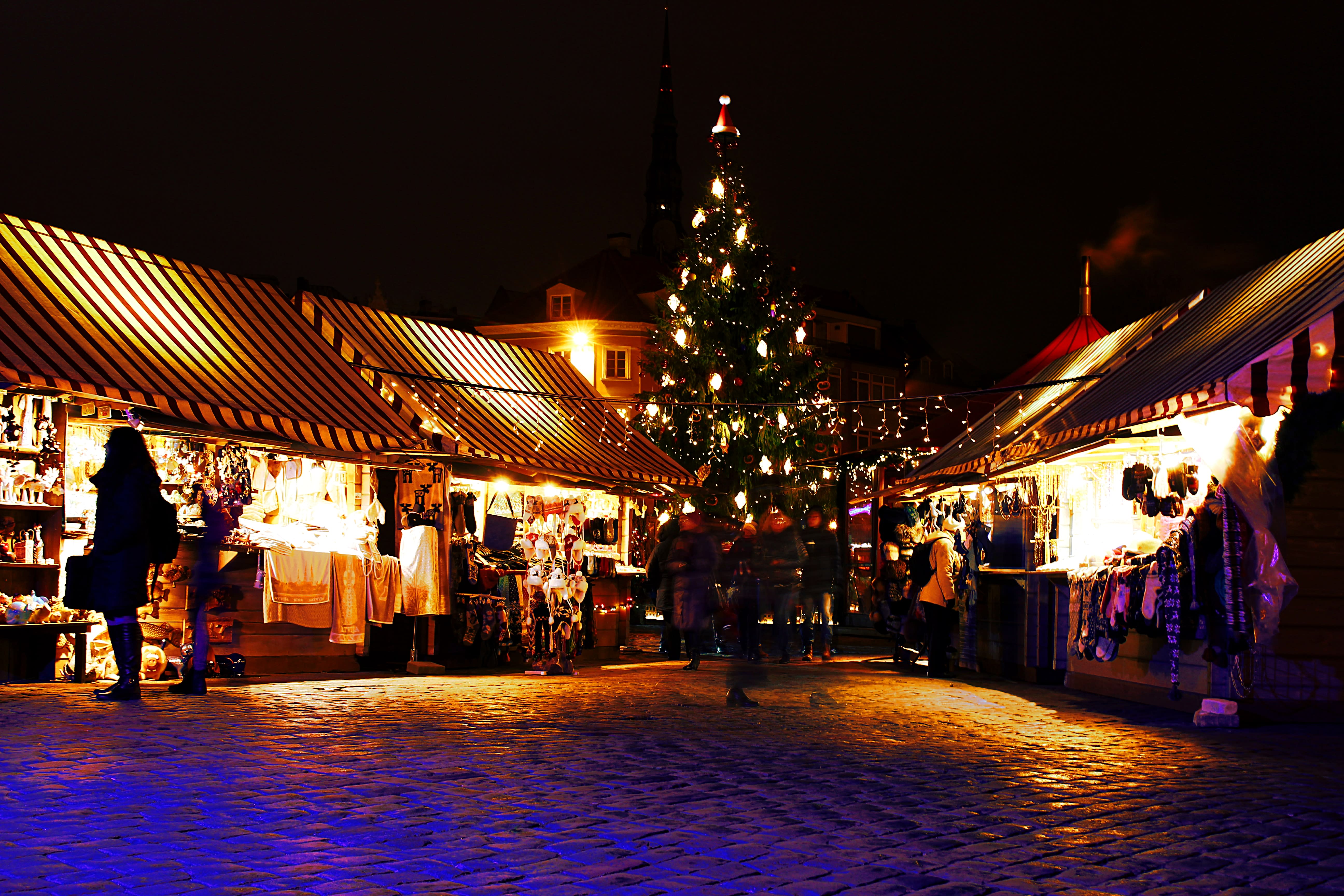 Image of Lighting, Urban, City, Person, Bazaar, Market, Shop, Handbag, Shoe, Christmas, Christmas Decorations, Festival,