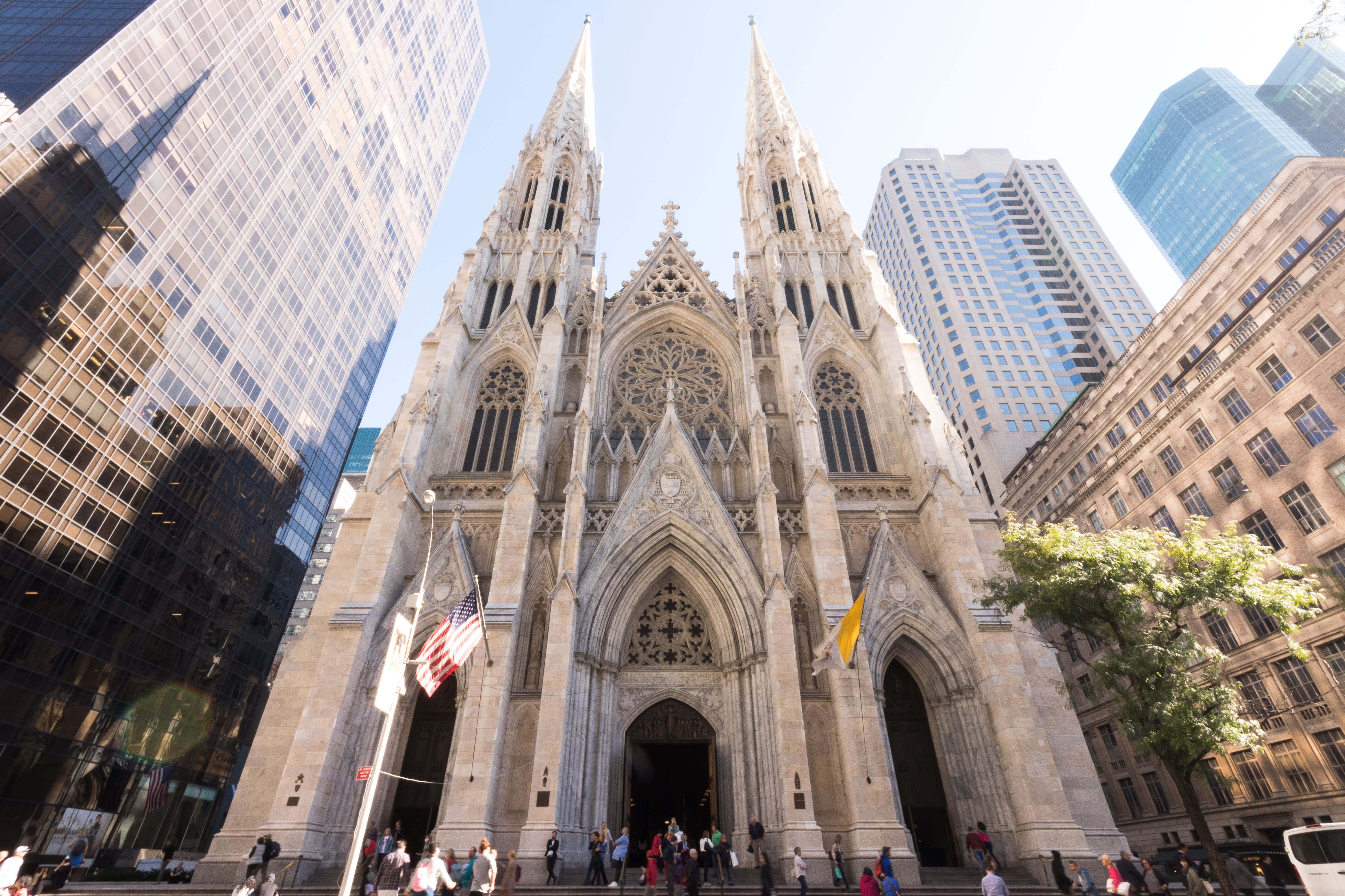 Image of Arch, Gothic Arch, Cathedral, Church, City, Spire, Tower, Person, Bus, 