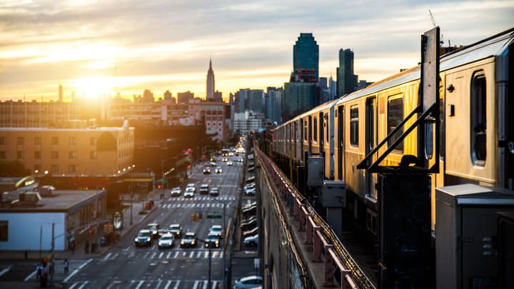 Image of City, Cityscape, Urban, Road, Metropolis, Neighborhood, Car, Vehicle, Railway, Train, Person, 