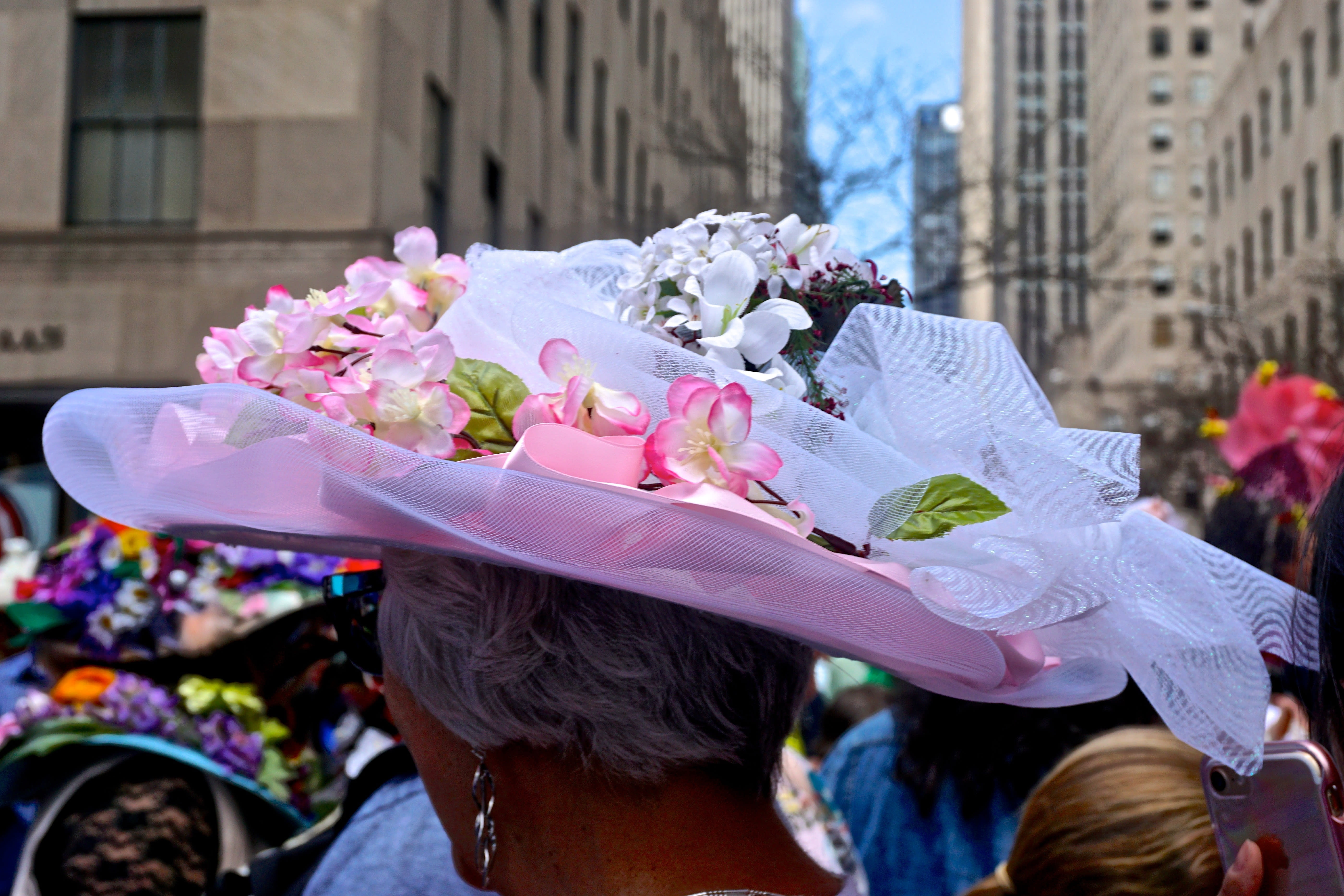 Image of Flower, Flower Arrangement, Flower Bouquet, Hat, Mobile Phone, Adult, Female, Person, Woman, Sun Hat, 