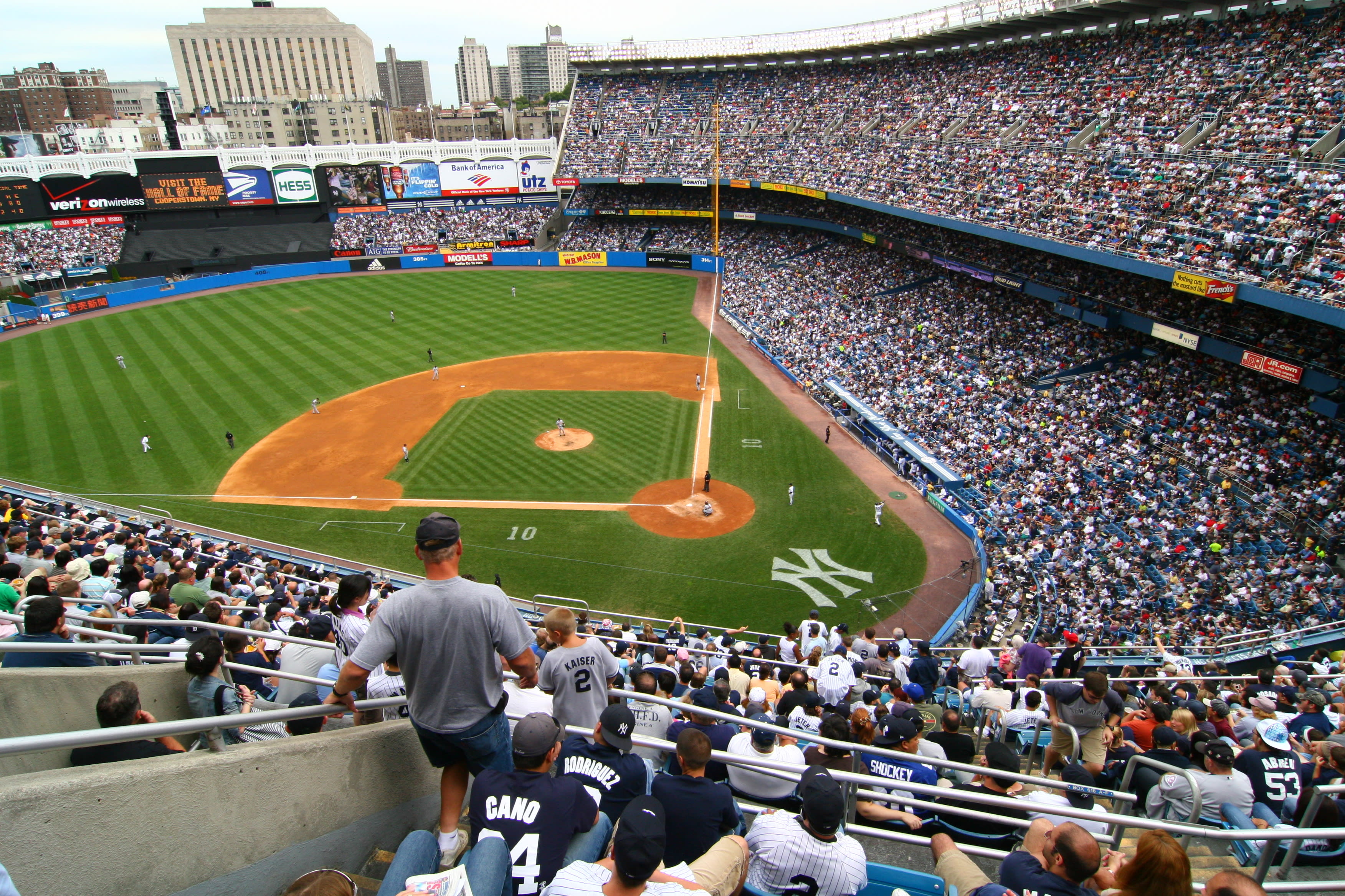 Image of People, Person, Adult, Male, Man, Field, City, Female, Woman, Baseball, Baseball Game, Arena, Stadium, 