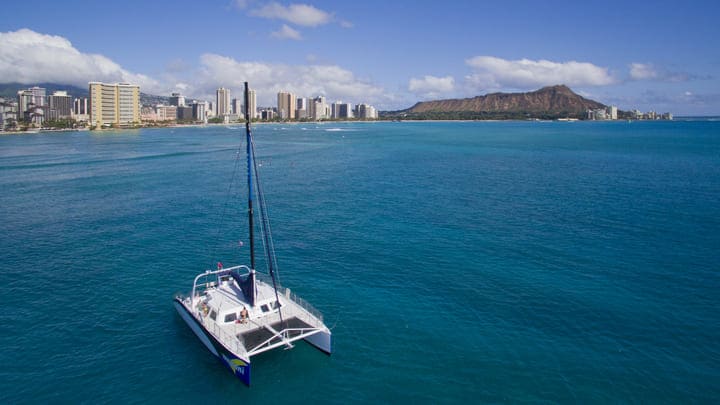 Image of Vehicle, Yacht, Boat, Sailboat, City, Nature, Outdoors, Sea, Water, Scenery, Land, Person, 