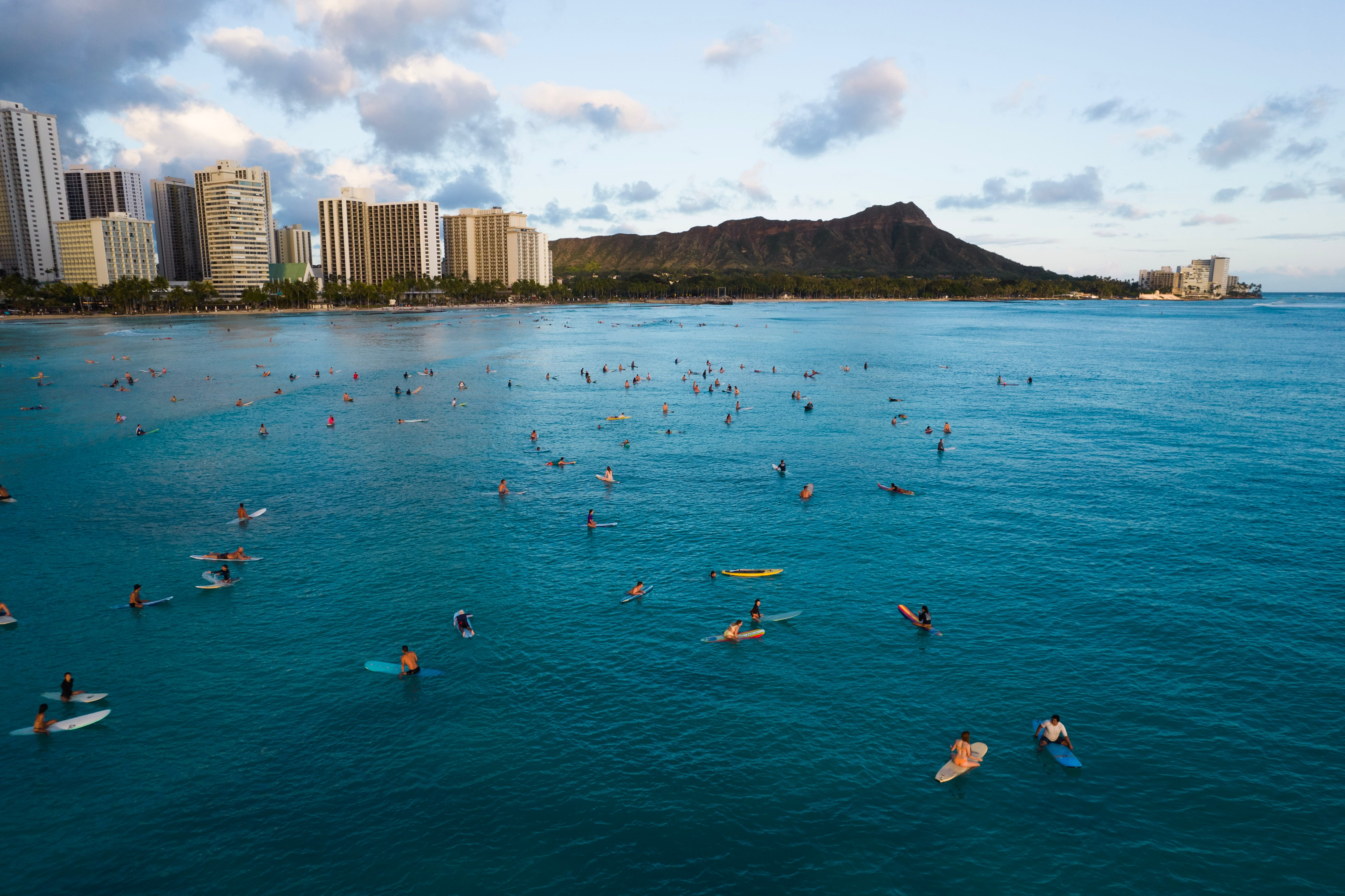 Image of Person, Swimming, Water, Water Sports, City, Nature, Outdoors, Sea, Urban, Cityscape, Land, Metropolis, Coast, Shoreline, Lake, Lagoon, 