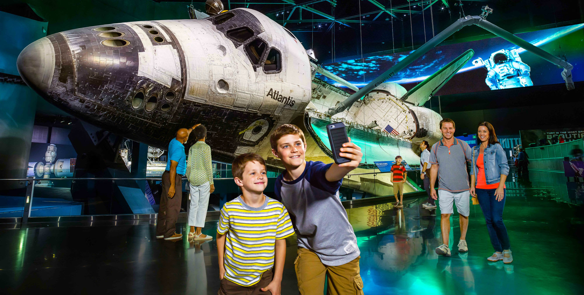 Image of Boy, Child, Male, Person, Indoors, Museum, Mobile Phone, Aircraft, Airplane, Vehicle, 