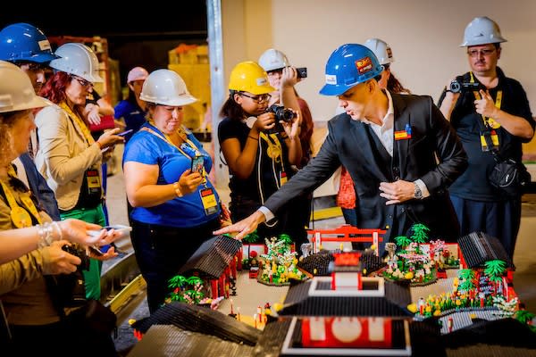 Image of Hardhat, Helmet, Person, Worker, People, Handbag, Adult, Female, Woman, Male, Man, 