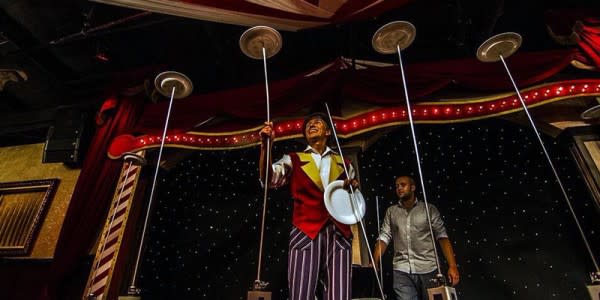 Image of Lighting, Adult, Male, Man, Person, Circus, Handbag, Performer, Solo Performance, 