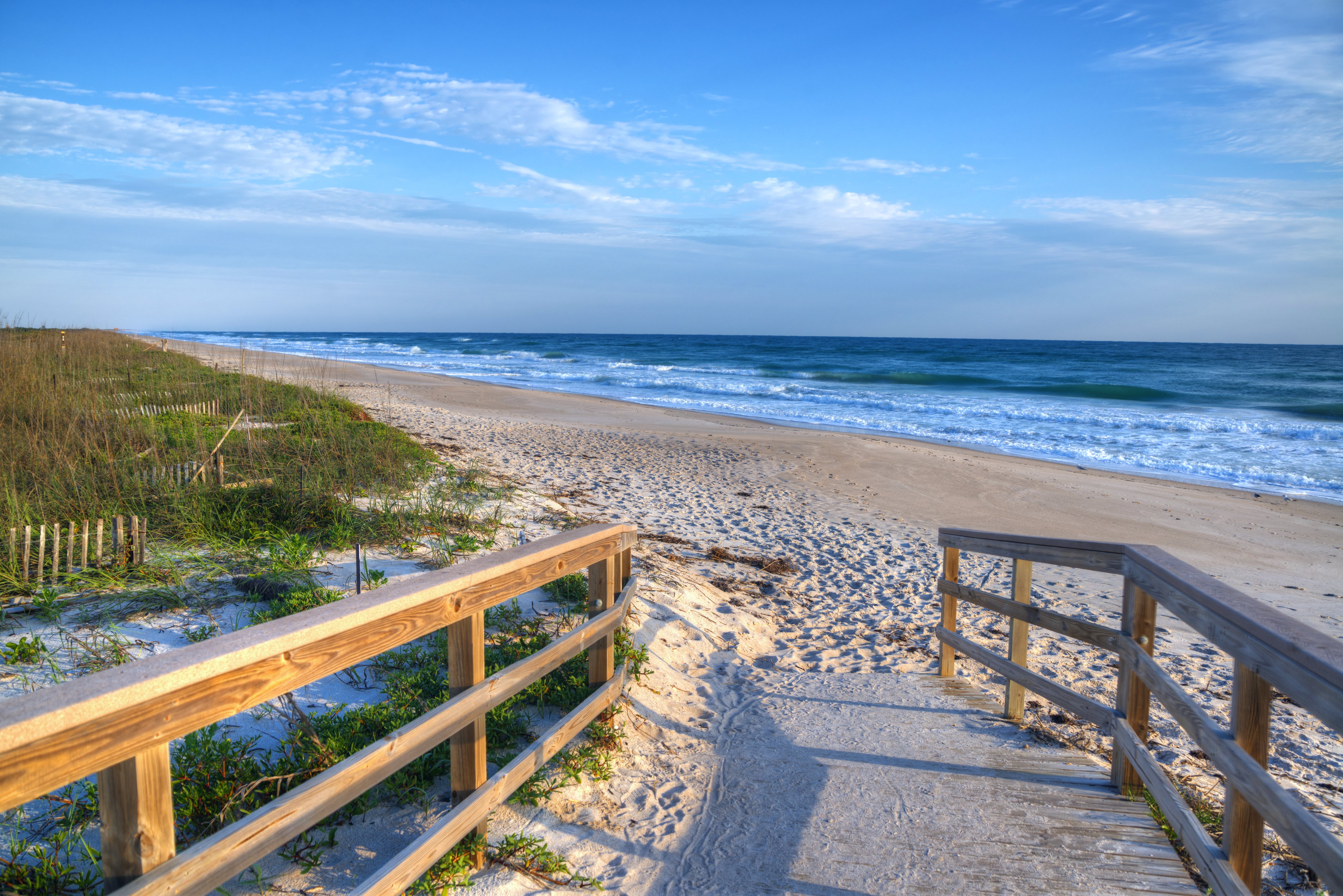 Image of Nature, Outdoors, Scenery, Handrail, Beach, Coast, Sea, Shoreline, Water, Horizon, Sky, Waterfront, Railing, Boardwalk, Bridge, Path, Wood, 