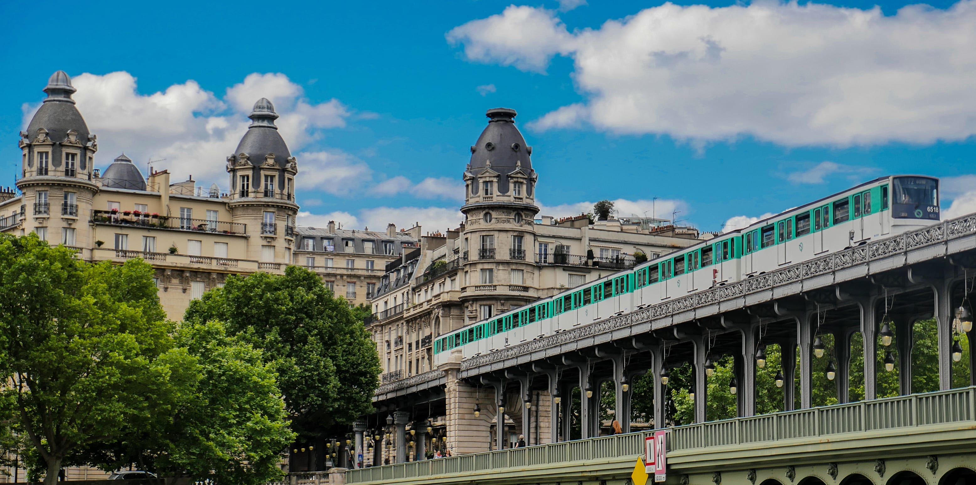 Image of City, Metropolis, Urban, Office Building, Cityscape, Railway, Train, Person, Car, 