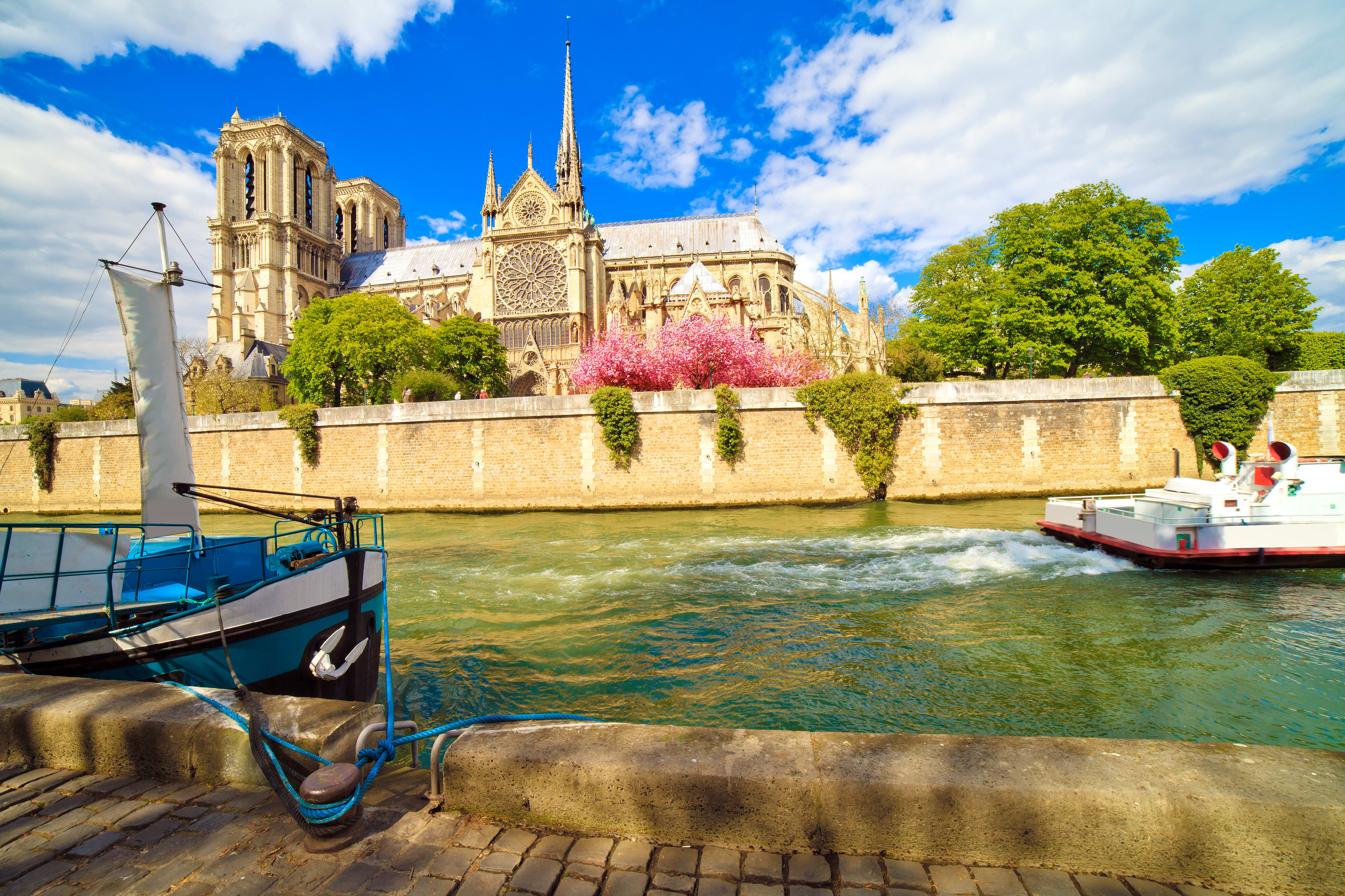 Image of Water, Waterfront, Spire, Tower, Vehicle, Watercraft, Arch, Boat, Castle, Fortress, Canal, Outdoors, Nature, Scenery, Cathedral, Church,