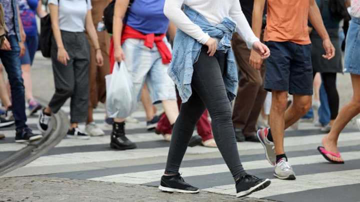 Image of Person, Walking, Pants, Pedestrian, Shoe, Adult, Female, Woman, Male, Man, Shorts, Bag, Handbag, 