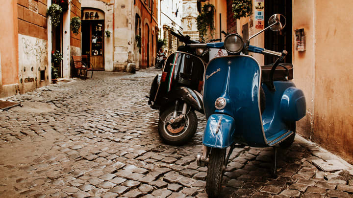 Image of Path, Bench, Road, Walkway, Scooter, Vehicle, Motorcycle, Person, Cobblestone, Motor Scooter, 