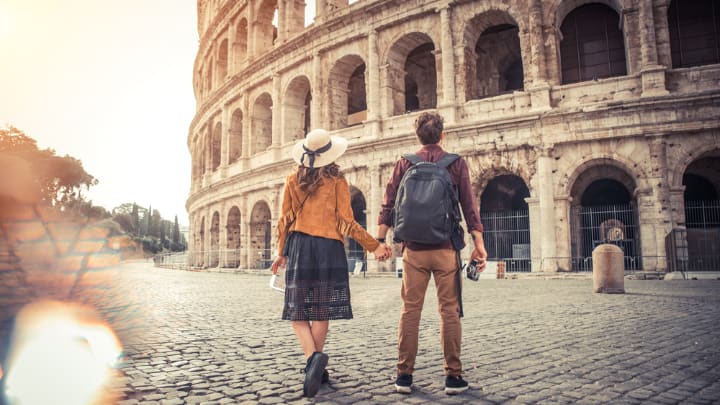 Image of Skirt, Adult, Male, Man, Person, Path, Female, Woman, Shorts, City, Hand, Holding Hands, Backpack, Bag, Photography, 