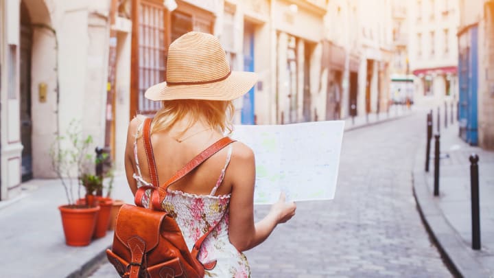 Image of Hat, Adult, Female, Person, Woman, Sun Hat, Accessories, Bag, Handbag, Plant, City, 