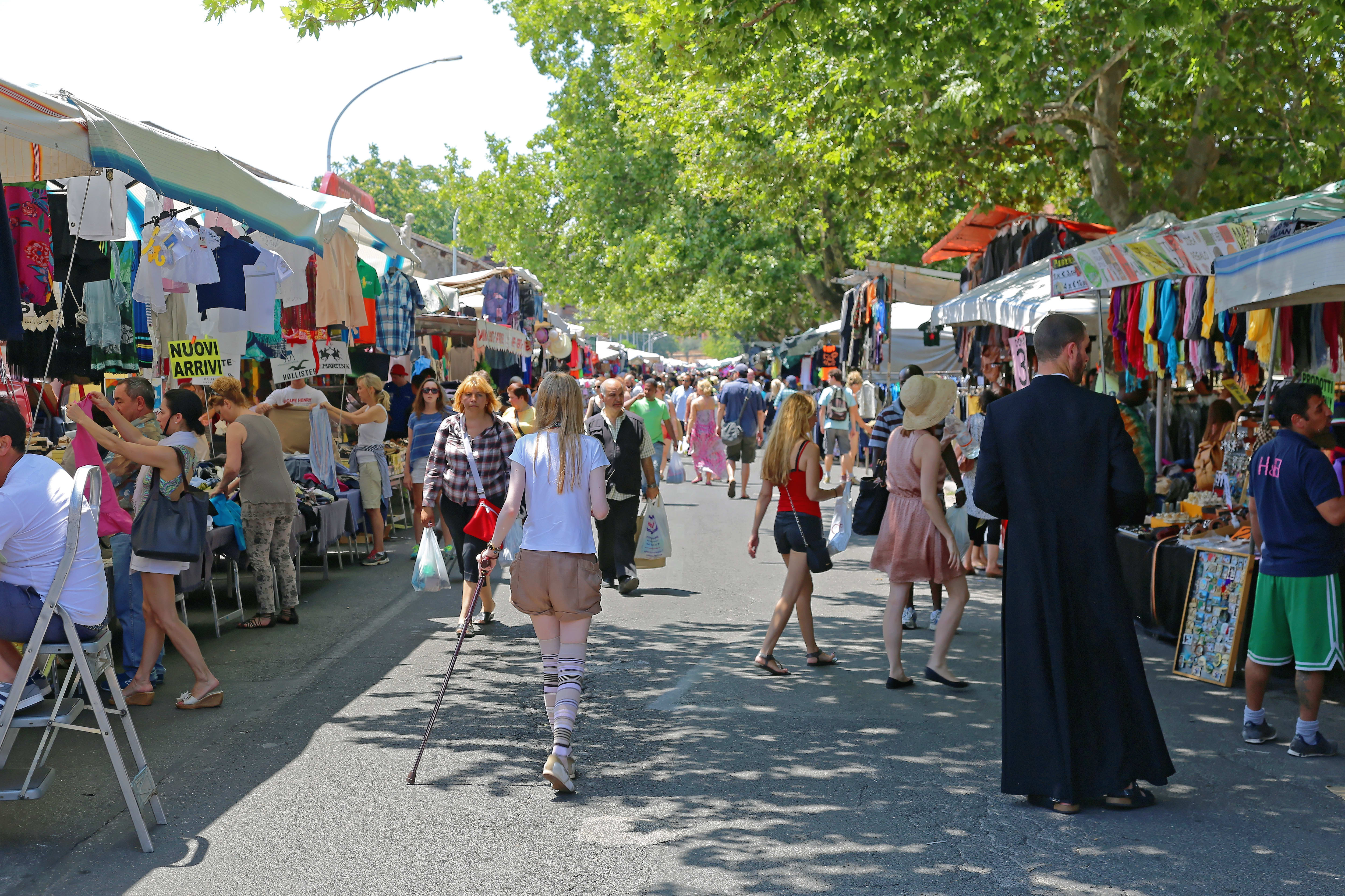 Image of Adult, Male, Man, Person, Accessories, Bag, Handbag, Child, Female, Girl, Woman, People, Skirt, Walking, Chair, 